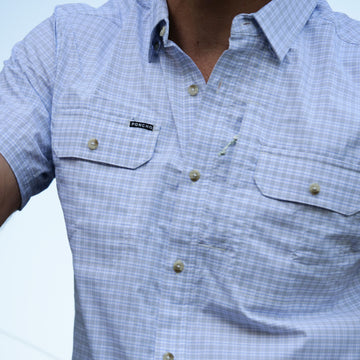 closeup of chest of grey plaid short sleeve shirt