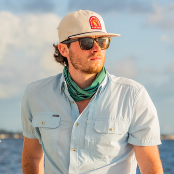 man wearing blue short sleeve shirt