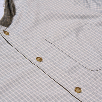close up of button up grey and white