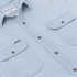 The Judd light blue button up shirt with four flap pockets and contrasting buttons