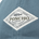 Close-up of a light blue fabric patch with the text Poncho, Austin Texas, and outdoors along with a fish graphic and decorative border