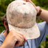 Top view of man wearing the Long Range hat