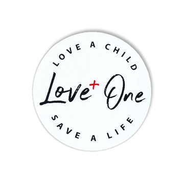 Circular Love One Save a Life graphic with black lettering and a red plus sign on a white background