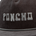 Close-up of a dark corduroy cap with the word "PONCHO" embroidered in bold white letters on the front panel.