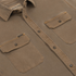 Close-up of The Monteagle brown shirt front with buttoned flap pockets and collar detail