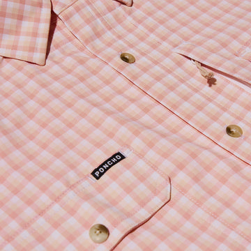 closeup of red plaid shirt chest pockets