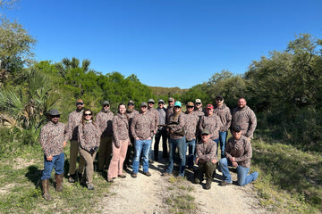 Group in camo on dirt road