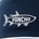 Close-up of a navy fabric with a white embroidered shark outline and the word "PONCHO" inside the shark shape.