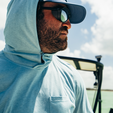 man wearing salty teal hoodie