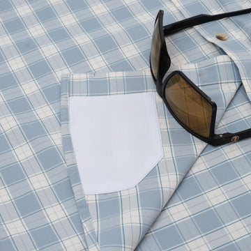 Sunglass cleaner on blue plaid ultralite shirt