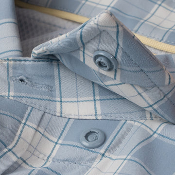Close up of button collar on blue plaid ultralite