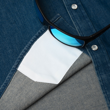 sunglasses with lens cleaner on shirt