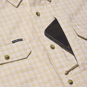 close up of phone in chest pocket