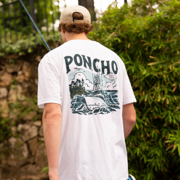 man holding fishing rod wearing the sport fisher tee