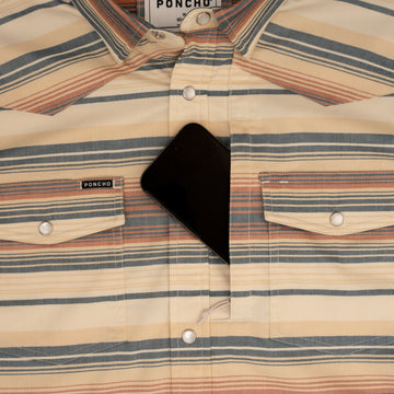 phone in chest zipper pocket of shirt