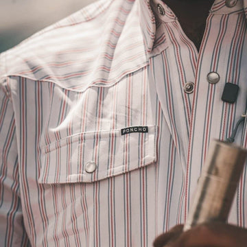 man wearing the 1776 shirt