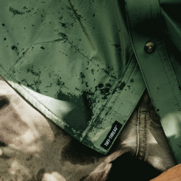 closeup of tuff thread patch with man wearing shirt