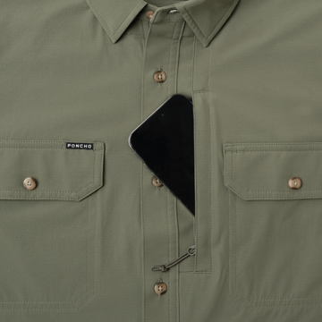 phone in chest zipper pocket of shirt