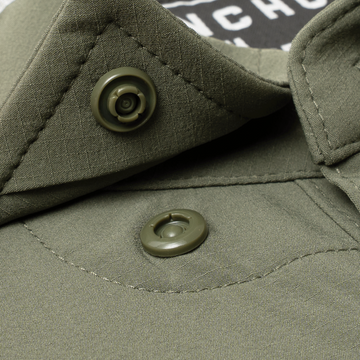 closeup of collar snaps on shirt