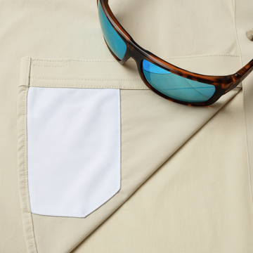 sunglasses with lens cleaner on shirt