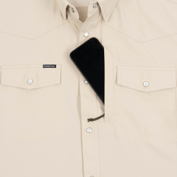 Phone in chest zipper pocket of shirt