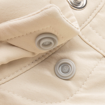 Closeup of collar snaps on collar of shirt