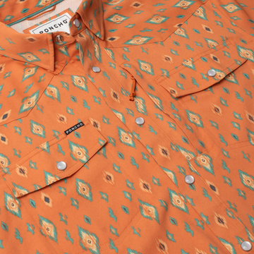 detail shot of orange pearl sap shirt