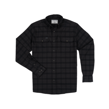 The Black Canyon shirt in black plaid with button front and flap chest pockets, perfect for outdoors.