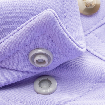 Closeup of collar snaps on collar of shirt