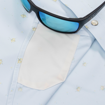 Sunglasses with lens cleaner on shrit