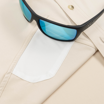 sunglasses with lens cleaner on shirt