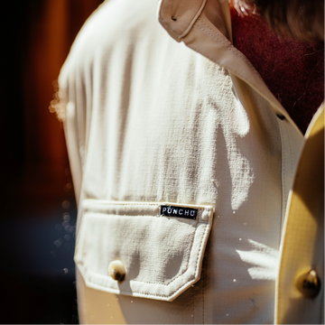 closeup of man wearing tan long sleeve shirt pocket