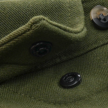 The Grizzly olive green mens outdoor shirt with textured fabric and black snap buttons