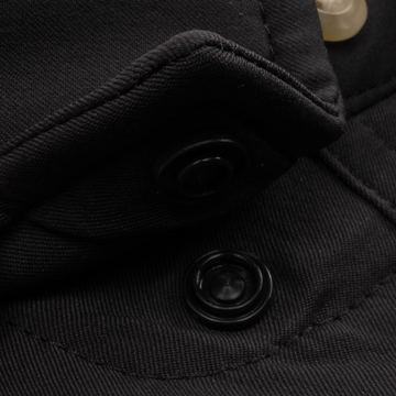 Closeup of collar snaps on collar of shirt