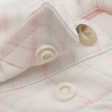 Closeup of collar snaps on collar of shirt