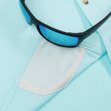 sunglasses with lens cleaner on shirt