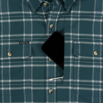 Close-up of The Codfather plaid shirt with hidden chest pocket holding a smartphone.