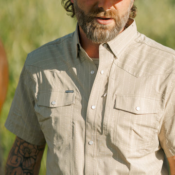 man with colorado springs shirt