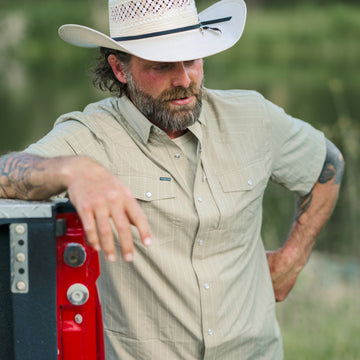 man with cowboy hat wearing colorado springs