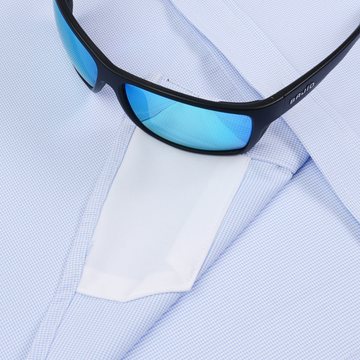 The Copano shirt styled with sleek black sunglasses featuring blue tinted lenses