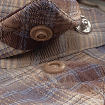 Closeup of collar snaps on collar of shirt