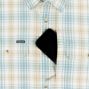 phone in chest zipper pocket of shirt