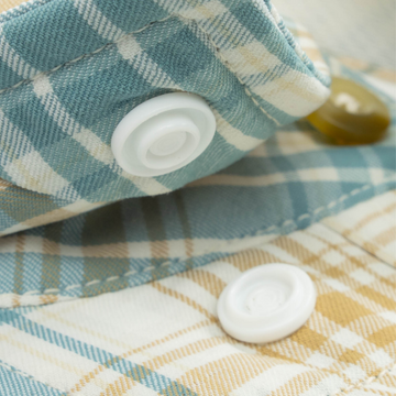closeup of collar snaps on shirt