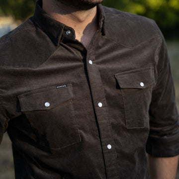 closeup of man wearing the dusty burrow corduroy shirt
