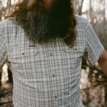 tight shot of man wearing The Everglades shirt