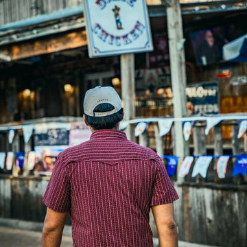 man walking with starry charcoal haze shirt
