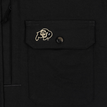 closeup of logo on pocket of shirt