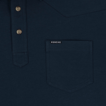 Close-up of navy shirt pocket with Poncho tag on The Front Porch shirt