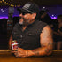 Man sitting at a bar wearing The Full Throttle Shirt