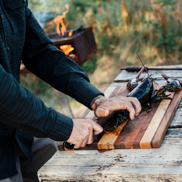 The Gloucester dark plaid shirt worn while preparing lobster outdoors